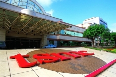 TSMC sees profits down