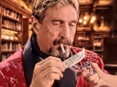 McAfee on the run again offers Cuba trade help