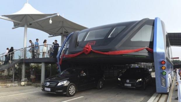 China investigates car-eating bus